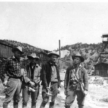 Miners stand in front of Kelly Mine